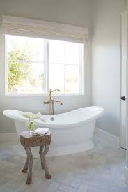 Black And White Modern Farmhouse Bathroom Black White Modern Farmhouse Meets Classic Tudor Style In Arizona White Marble Bathrooms Bathroom Design Inspiration Classic Bathroom