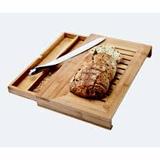 Bread boards and cheese boards are ideal for entertaining, since they can withstand knife marks but are nice enough to leave on the table during a dinner party. Bamboo Bread Cutter Slicer With Crumb Catcher Bread Cutting Board With Drawer And Knife Buy Bread Slicer Bread Cutting Board Bread Board Product On Alibaba Com