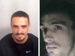 Man wanted after two police officers attacked