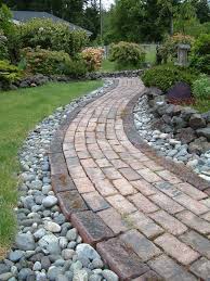 A diy pathway made of stone pavers is a great way to save your lawn from being trampled and compacted by foot traffic. Stone Walkways 17 Easy To Imitate Garden Paths Bob Vila