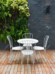 Vintage table bases, or bistro bases, bring the intrinsic feel of a timeless café or bistro to your space. Vintage Outdoor Coffee Table In Cafe Wooden Terrace Stock Photo Picture And Royalty Free Image Image 34664698