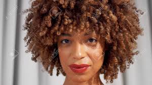 Today, we are going to talk about braid out hairstyle to. Mixed Race Black Woman With Curly Hair And Natural Warm Make Up Stock Photo Picture And Royalty Free Image Image 144706052