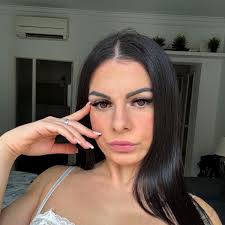 Catholic nursery teacher fired after parents recognised her in racy photo  online - Daily Star