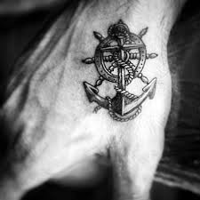 Awesome Anchor With Ship Wheel Small Mens Hand Tattoo Ideas Cool Small Tattoos Small Tattoos For Guys Hand Tattoos