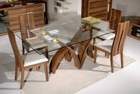 We have a formal dining room and in it is one of our finest pieces of furniture which is a large antique dining table that can accommodate 10 people. Tempered Glass Table Top Fanpageanalytics Home Design From The Wonderful Glass Top Dining Table Pictures