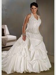 A halter top wedding dress features straps or fabric that turn inward, often tying, hooking or otherwise connecting behind the neck. Pin On Wedding Dresses Plus Size