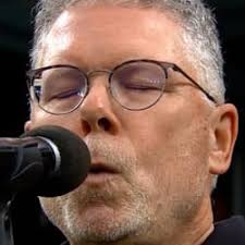 Chris Ullman whistles the National Anthem