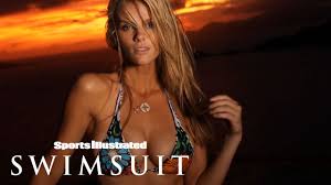 Brooklyn decker was on jimmy kimmel friday night to discuss her recent sports illustrated swimsuit cover (see the cover here).the two talked decker's tenure in the swimsuit issue (i'm a veteran at 22), whether she felt sorry for husband, tennis star andy roddick, because he had never graced the si cover (no.), and what it was like wearing body paint instead of a swim suit. Brooklyn Decker Takes A Sip On Heaven Against The Sunset Intimates Sports Illustrated Swimsuit Youtube