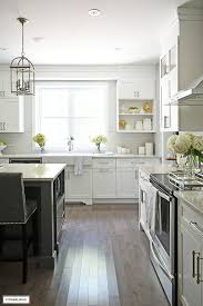 Inky blue black cabinets polished nickel hardware style. White And Grey Kitchen A Hardware Update Citrineliving