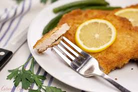 Schnitzel is like a breaded pork chop, but the cut of meat is very thin. Traditional German Pork Schnitzel Curious Cuisiniere