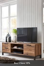 Consider a corner unit with storage cabinets or drawers to house entertainment devices, electronics, or consoles. Tv Units Corner Wide Tv Stands Next