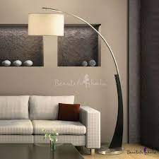 The arco floor lamp provides direct light from above. Overarching Metal Floor Light Modernist Single Black Standing Floor Lamp With Drum White Fabric Shade Beautifulhalo Com