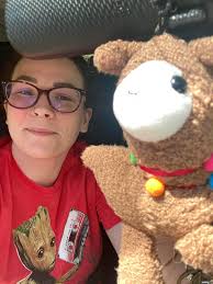 My Grogru phone holder and my scentsy buddy for my vehicle.