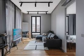 This picture of an ocean waterfront with crashing waves visually expands the room beyond the physical walls, while the soft grey tones of the graphic also set the color scheme for the rest of the room. 3 Reasons Why This Apartment Design Will Be Trending In 2021 Decoholic