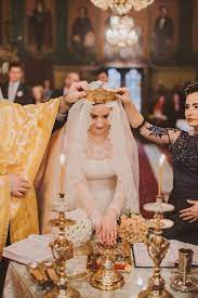 Romanian Wedding With A Wedding Cake Calamity Anne Ionut I Love The Tradition Of Wedding Crowns Romanian Wedding Wedding Crown Orthodox Wedding