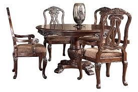 The North Shore Dining Table From Ashley Furniture Homestore Http Www Mmfurniture Com North Shor Round Dining Room Sets Round Dining Room Dining Room Table