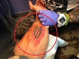 Tattoo artist john kural presses the buzzing needle to his ribcage, and coolio's gangsta's paradise. Dave Bautista S 33 Tattoos Their Meanings Body Art Guru