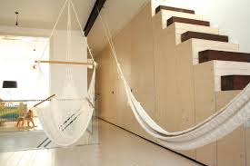You can also, if you're feeling a bit adventurous (and have the right hardware!) add one to your living room. Chic Hanging Hammock Chair Inspiration For Living Room Modern