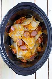 Then evenly sprinkle 1/2 the diced kielbasa over the sour cream. Crock Pot Cheesy Pierogi Kielbasa Casserole The Country Cook
