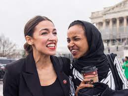 Ilhan omar hates this picture and she hates when people share it, reads the text above two images of omar, one in which she's wearing her usual head scarf and another in which she appears to have two small tufts of hair without it. Aoc And Ilhan Omar S Among Us Twitch Stream Coronates Them As Official Gamer Royalty Teen Vogue