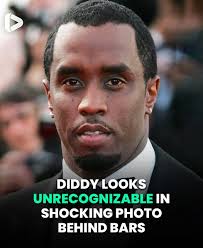 The disgraced music mogul looks completely different.