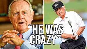 Wally Armstrong uses a mop to demonstrate the proper backswing