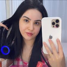 Sabrina Carpenter added a new photo.