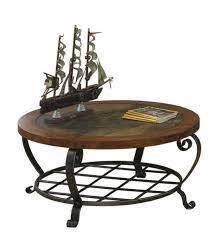 Round coffee table serves as a modest yet elegant living room ad. Round Slate Coffee Table Ideas On Foter