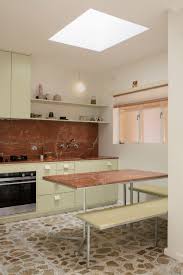 A tutorial showing the process of cutting and installing glass panels into a glass cabinet door frame. Pistachio Green Kitchen And Terrazzo Tiles Update 60s Brunswick Apartment