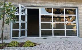 Clear Glass Garage Doors With Passing Door Glass Garage Door Garage Doors Modern Garage Doors