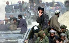 An afghan national army soldier surveying atop a humvee; Afghanistan La Guerra Civile Parte Dal Pakistan