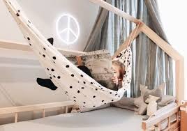 If you have started shopping for an indoor hammock bed, you may be overwhelmed at where to begin. How To Design The Perfect Montessori Toddler Room The Toddler Playbook Montessori Toddler Rooms Kids Hammock Montessori Toddler