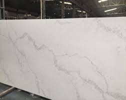 Calacatta leon quartz is a beautiful and unique stone with clean white lines and striking grey veining throughout. Calacatta White Quartz The Most Beautiful Marble Looking Quartz Slabs And Countertop Quartz Kitchen Countertops Marble Countertops Outdoor Kitchen Countertops