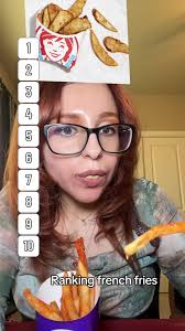 Girl Eats French Fry Like Bird