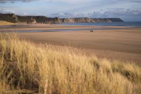 Voted as wales' best beach in 2018, and located within the uk's first area of outstanding natural beauty, rhossili bay is a sight to behold. Sands Of Torture Lockdown On The Gower Peninsula South Wales Uk Driftwood Journals