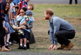 Prince harry playing the piano at kensington prince philip after a celebrity cricket match against the duke of norfolk at arundel, august 1953. Meghan And Harry Hold Hands And Hug Young Fans On Royal Tour