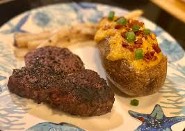 Dinner: seared filet, white asparagus and twice baked with fresh salad.