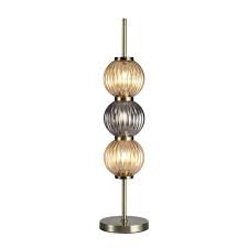 No matter your interior style, you're bound to find the perfect table lamp here at homebase. 3 Light Table Lamp Antique Brass Smoked Amber Glass Lighting Company