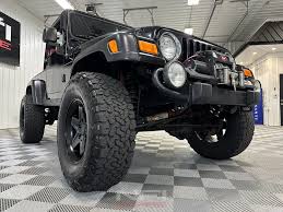 Image result for Brilliant Black 2005 Jeep
