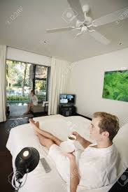 We did not find results for: Man Enjoying Coffee On Bed While Woman Is Sitting At Lounge Chair Stock Photo Picture And Royalty Free Image Image 7445951