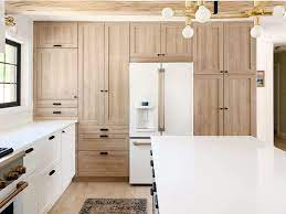 For wood cabinets with an old, dull finish that used to be clear and bright, mineral spirits may help refresh the appearance while removing stubborn. How We Organized The Fullmer S Kitchen Cabinets A Video Tour Inside Chris Loves Julia