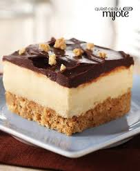 Carres Au Beurre D Arachide Et Au Chocolat Qu Est Ce Qui Mijote De Kraft Recipe Desserts Peanut Butter Recipes Kraft Recipes