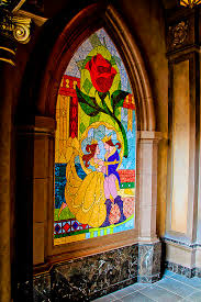 A stained glass image of the prince comes to life as a narrator tells the story of the beast's enchantment. Beauty And The Beast Stained Glass Disney World Pictures Disney Stained Glass Disney Magic