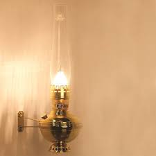 Our woodshed wall mounted oil lamp projects more light with round, removable reflector. Aladdin Deluxe Brass Wall Oil Lamp Lehman S