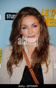 In this May 5, 2015 photo, Nadia Irsan, who is accused of stalking her  sister, her sister's husband, and her best friend, whom were gunned down in  2013, appears in the 184th