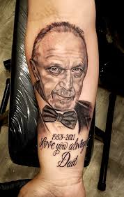 Laced With Ink Tattoo added a new...