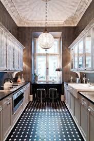 A galley kitchen can look wider as long as you provide enough lightings by using bright or pastel colors for the cabinets is a good choice to create a minimalist feeling. 6 Small Galley Kitchen Ideas That Are Straight Up Great Galley Kitchen Design Small Galley Kitchens Inexpensive Flooring
