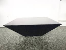 This stylish furniture piece is actually a large trunk, but its surface can also be used to display your favorite items. Postmodern Contemporary Triangle Pyramid Coffee Table Coffee Table Metal Modern Coffee Table Coffee Tables For Sale