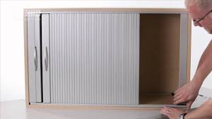 The cupboard is supplied in two. Installing A Double Horizontal Tambour Door With Top Track Youtube