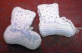 Knitted baby booties ~ use this free cable knit pattern to make baby booties. 29 Free Patterns For Knitted Baby Booties Guide Patterns